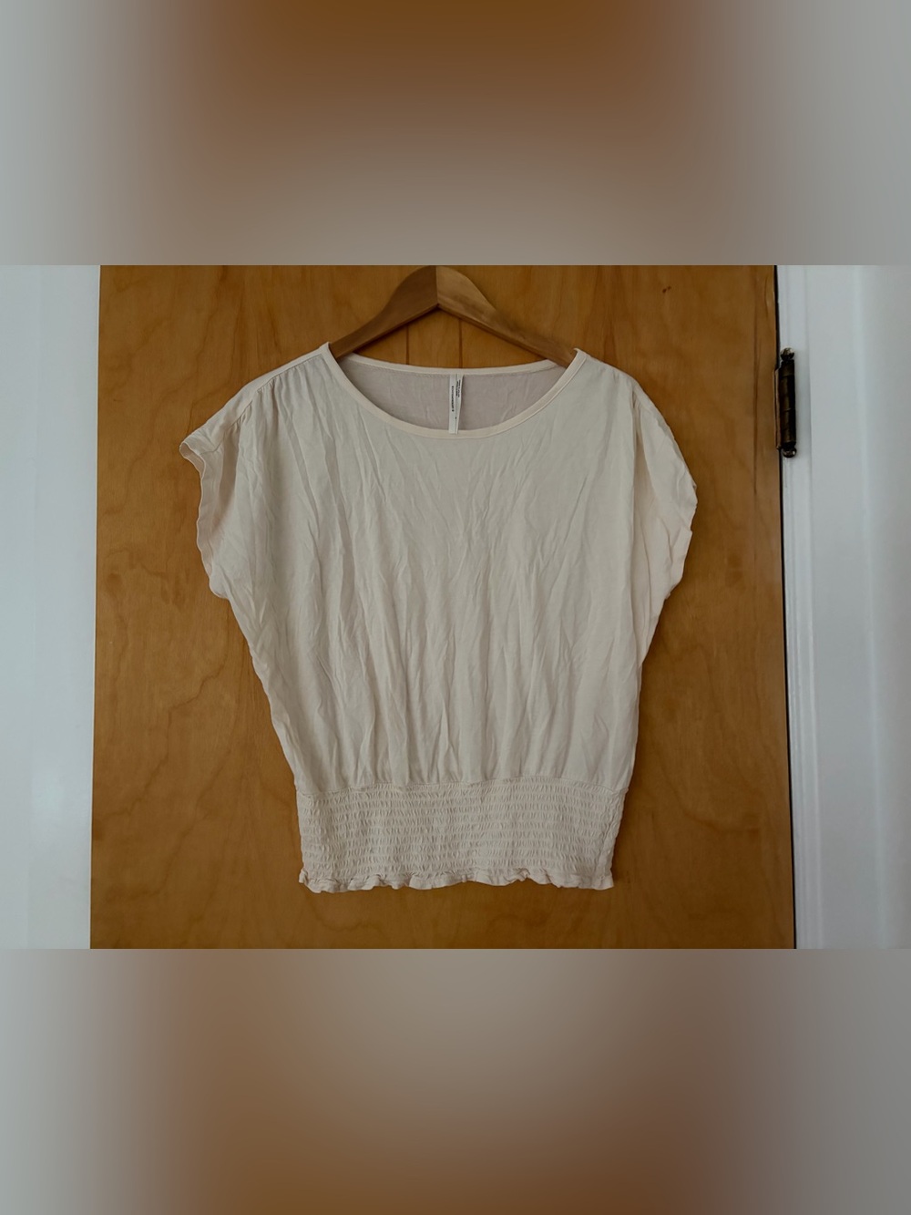 Anthropologie Light Cream Short Sleeve Smocked-Waist Top